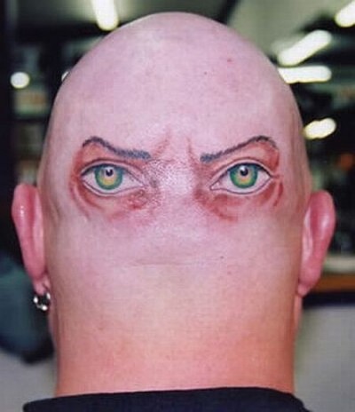 eye in the back of the head tattoo