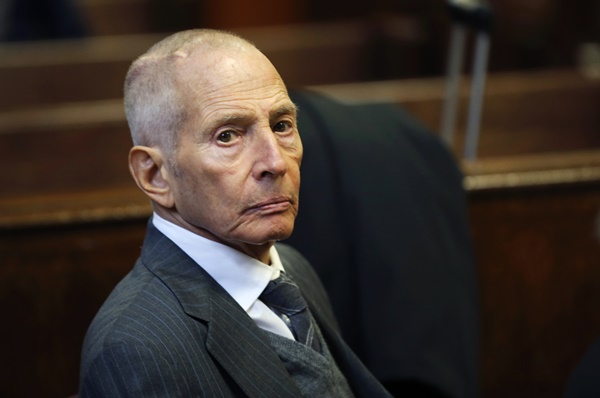 A photograph of Robert Durst in a suit.
