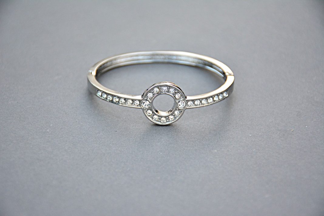 Silver beautiful ring in silver background